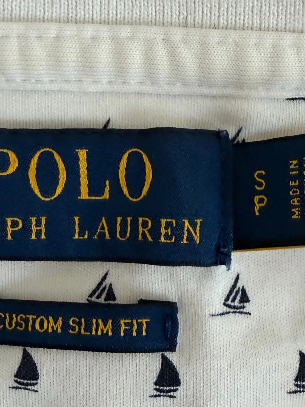 Polo by Ralph Lauren White Polo with Navy Sailboat Print and Gold Logo